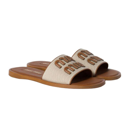 Miu miu Raffia-effect woven fabric slides
