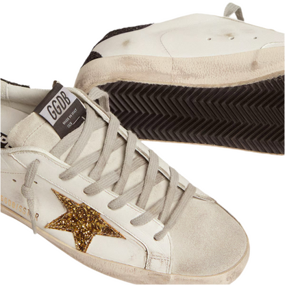 Golden Goose Women’s Super-Star in nappa leather with gold glitter star and black glitter heel tab