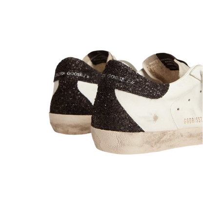 Golden Goose Women’s Super-Star in nappa leather with gold glitter star and black glitter heel tab